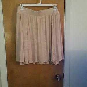 Light pink knee length skirt